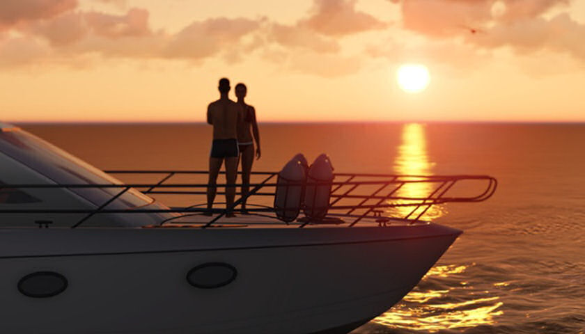 couple on yacht at sunset